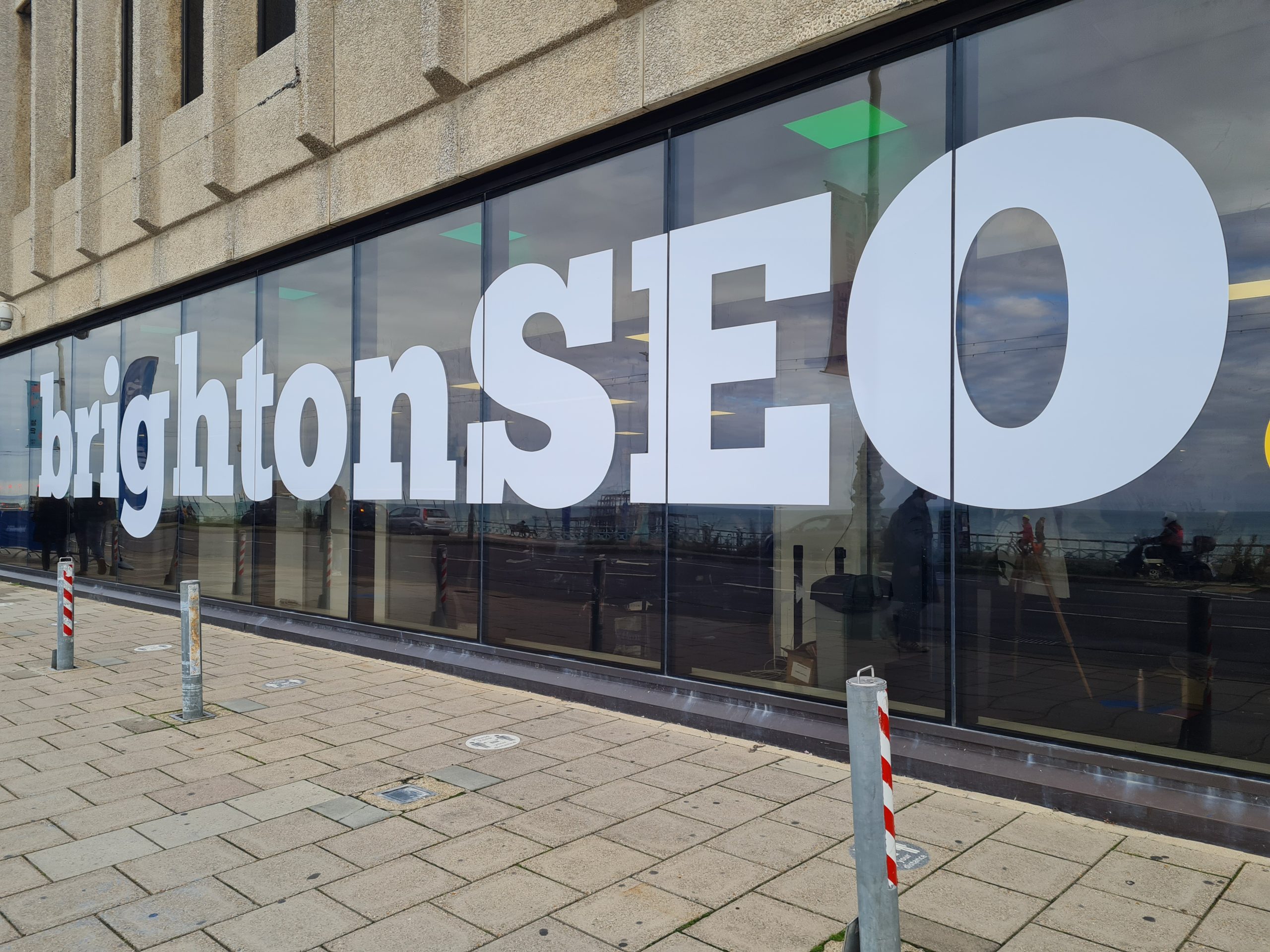 brightonSEO - large sign on the front of the Brighton Centre saying brightonSEO